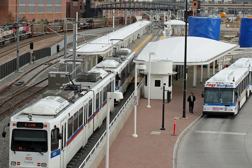 A bus next to the re-located light rail station at Denver's Union Station